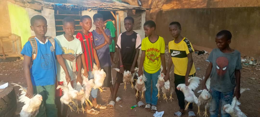 Students at Sina Keita primary school started a business rearing poultry.